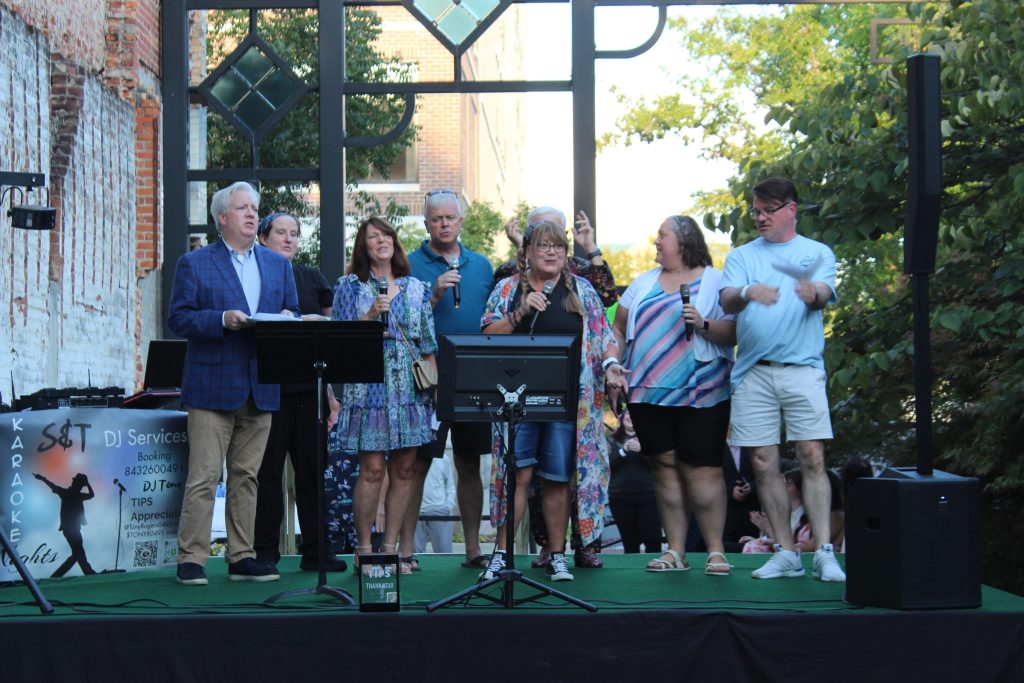 Opening entertainment on stage at the 2025 Singing for Suppers